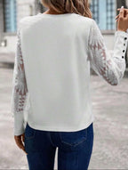 Top gofrado con mangas de encaje Coqueteo