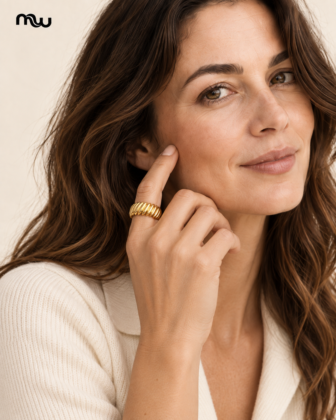 Female model wearing the Solstice Sculpted Ridge Ring