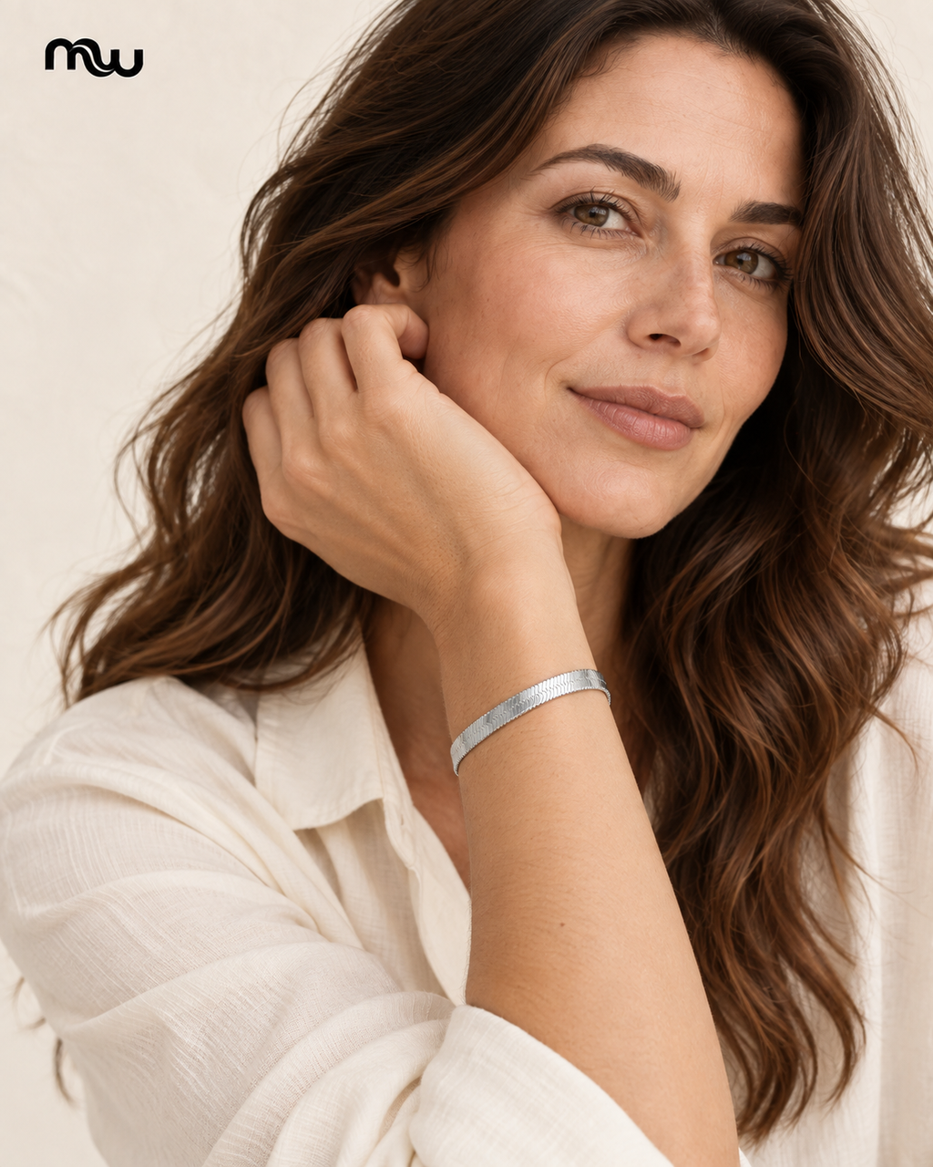 Female model wearing the Liquid Silver-Tone Layering Bracelet