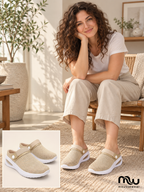Female model wearing Slow Morning Knit Clogs, with shoe close-up and Moussewear logo