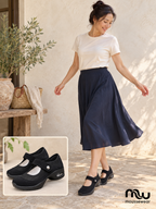 Female model wearing Moving Grace Mesh Mary Janes, with shoe close-up and Moussewear logo