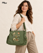 Female model showcasing the Eden Botanical Flap Bag with Moussewear logo
