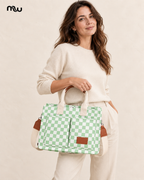 Female model showcasing the Checkmate Checkered Pocket Tote with Moussewear logo