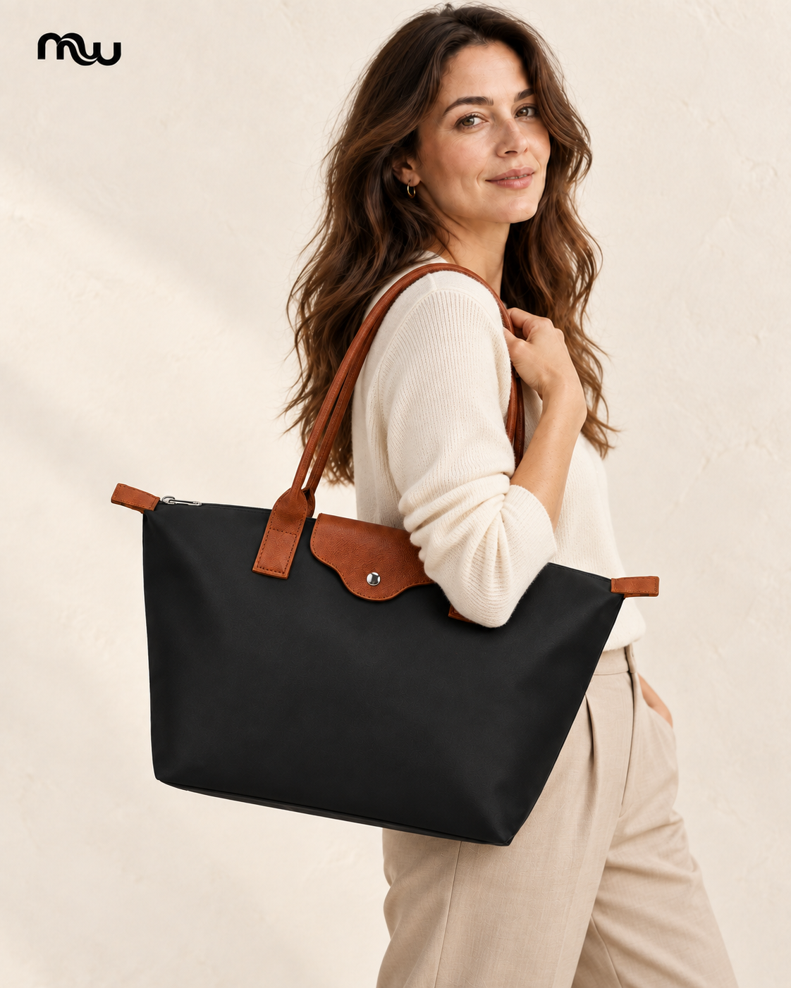 Female model showcasing the Voyage Foldable Tote with Moussewear logo