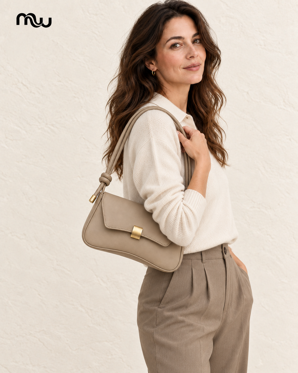 Female model showcasing the Tease Knot-Strap Mini Bag with Moussewear logo
