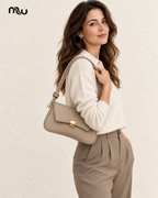 Female model showcasing the Tease Knot-Strap Mini Bag with Moussewear logo