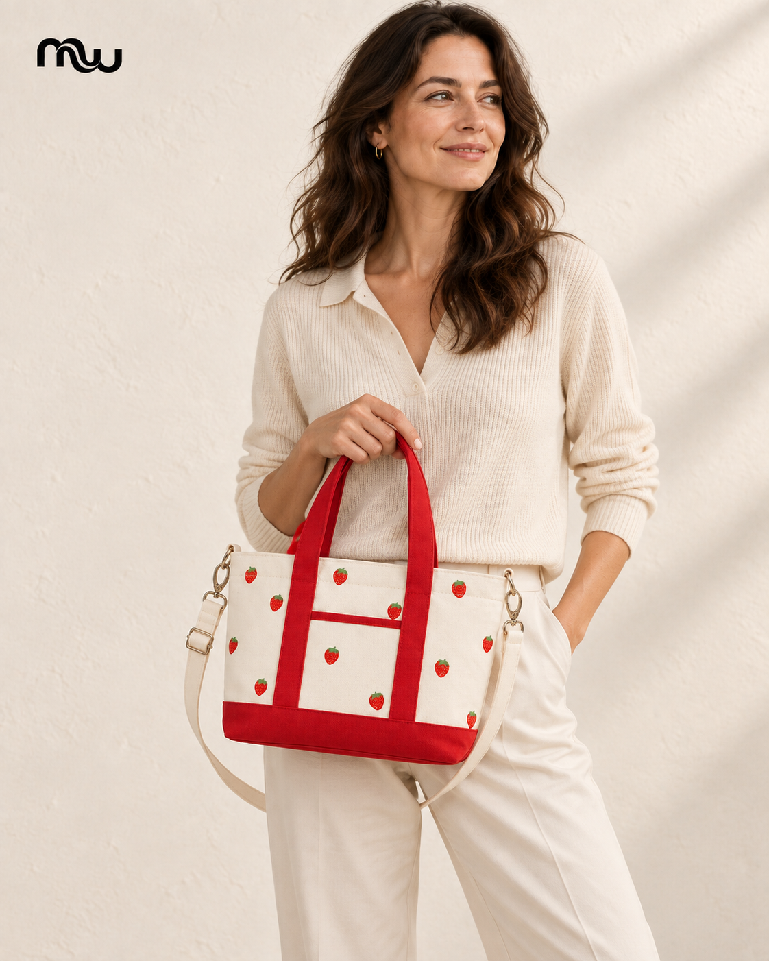 Female model showcasing the Juicy Strawberry Tote with Moussewear logo