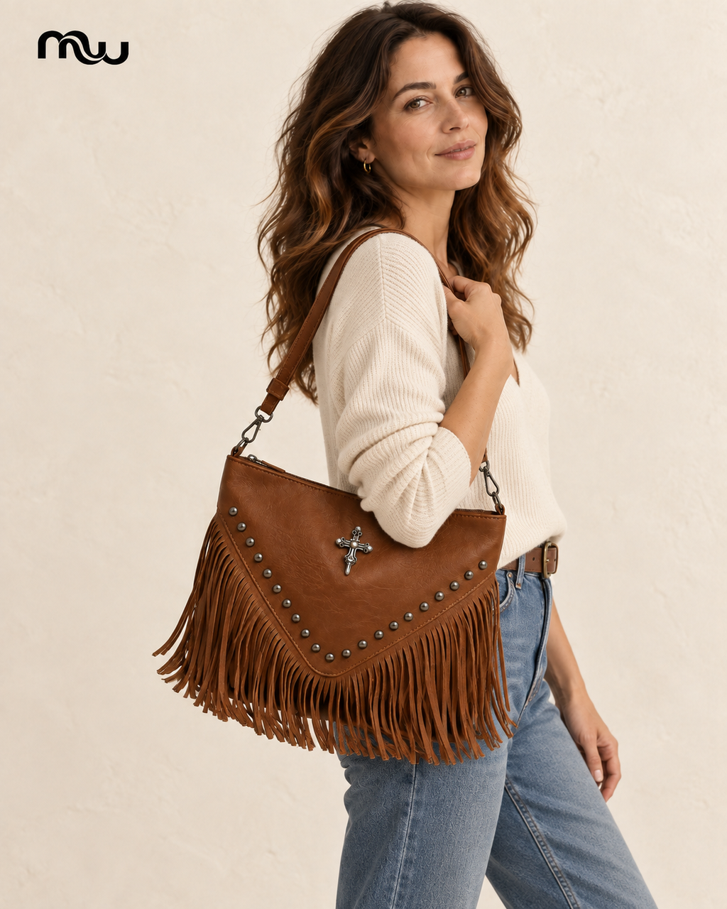 Female model showcasing the Wild West Fringe Shoulder Bag with Moussewear logo