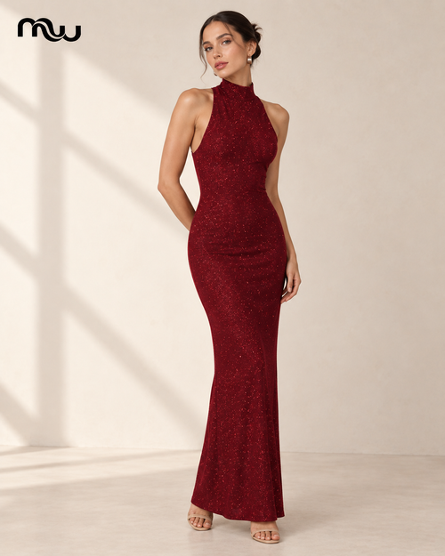Model wearing the All Eyes On Me Sequin Maxi Dress with Moussewear logo