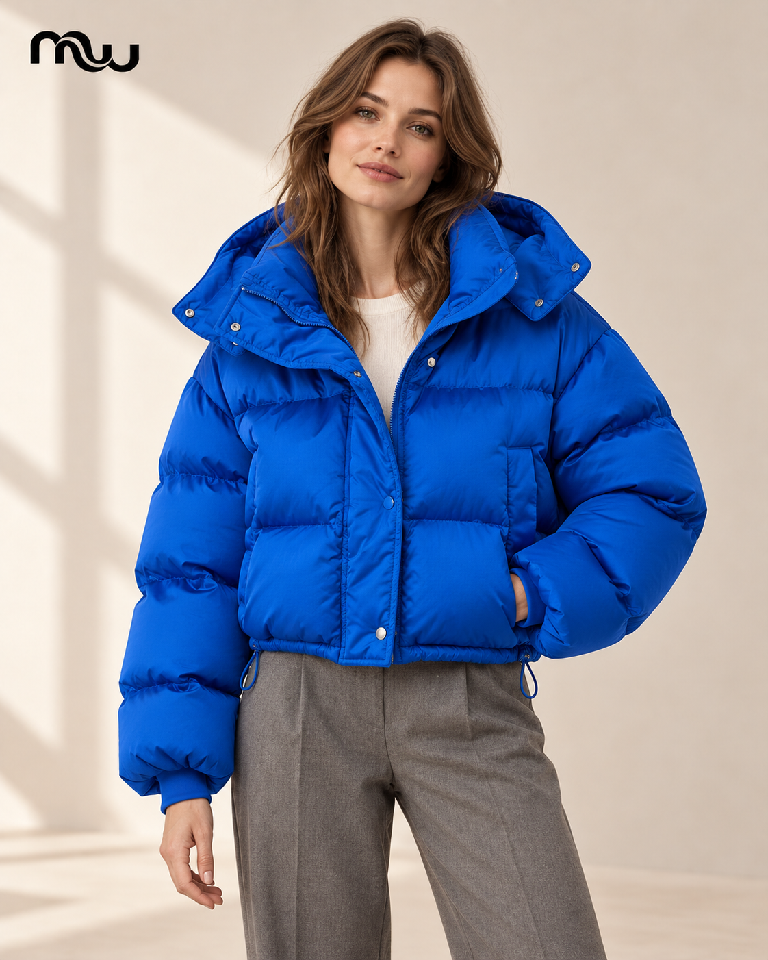 Model wearing the Icon Cropped Puffer Jacket with Moussewear logo