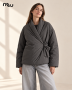 Model wearing the Allure Padded Wrap Jacket with Moussewear logo