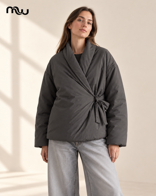 Model wearing the Allure Padded Wrap Jacket with Moussewear logo