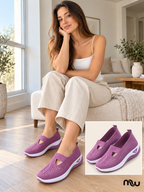Adult female model wearing Soft Landing Knit Slip-On Shoes, with Moussewear logo and shoe close-up