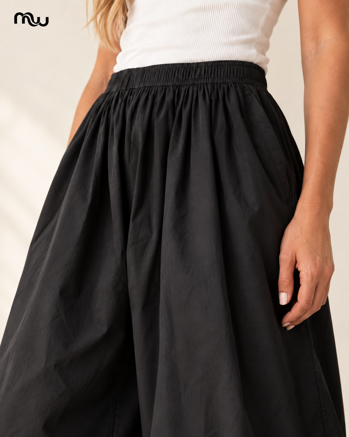 Swagger Cotton Balloon Trousers — female model presentation — detail — MW