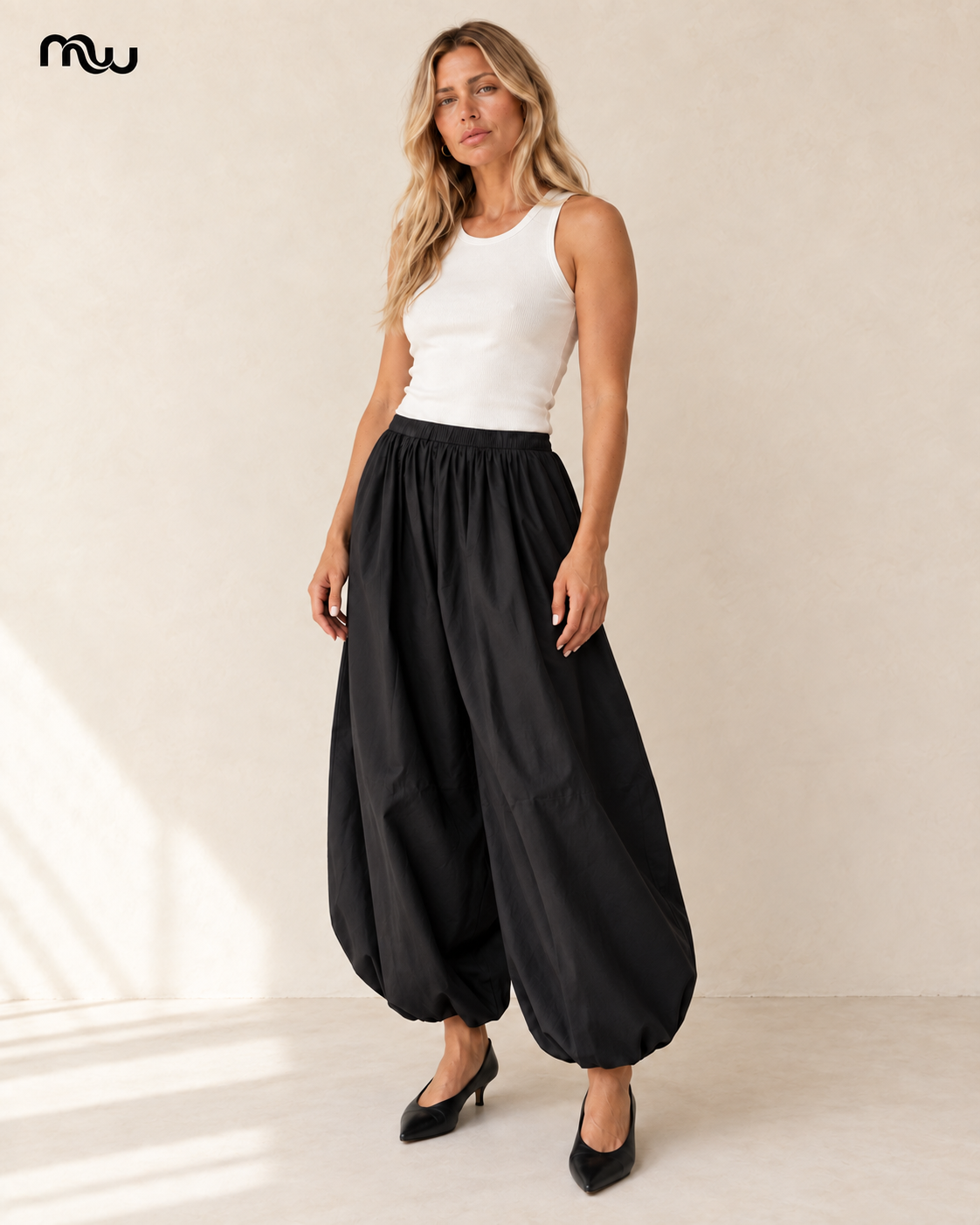 Swagger Cotton Balloon Trousers — female model presentation — lifestyle — MW